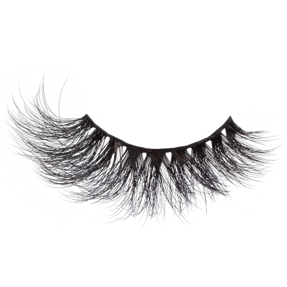 Full-volume Bombshell lashes from the Twilight Collection, featuring a lush, layered look and defined edges.
