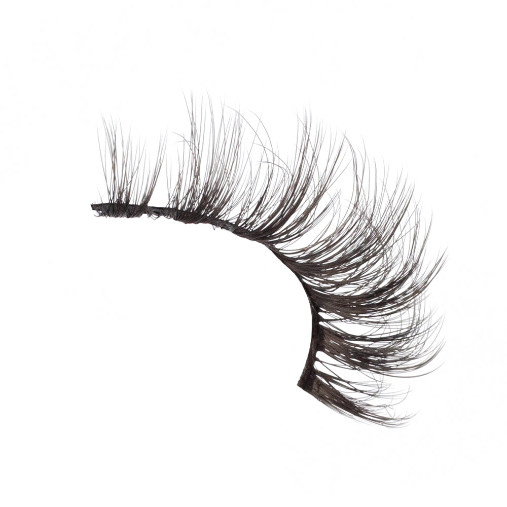 Raven lashes featuring a clustered, multi-length design and sweeping curls for a bold, glamorous look.