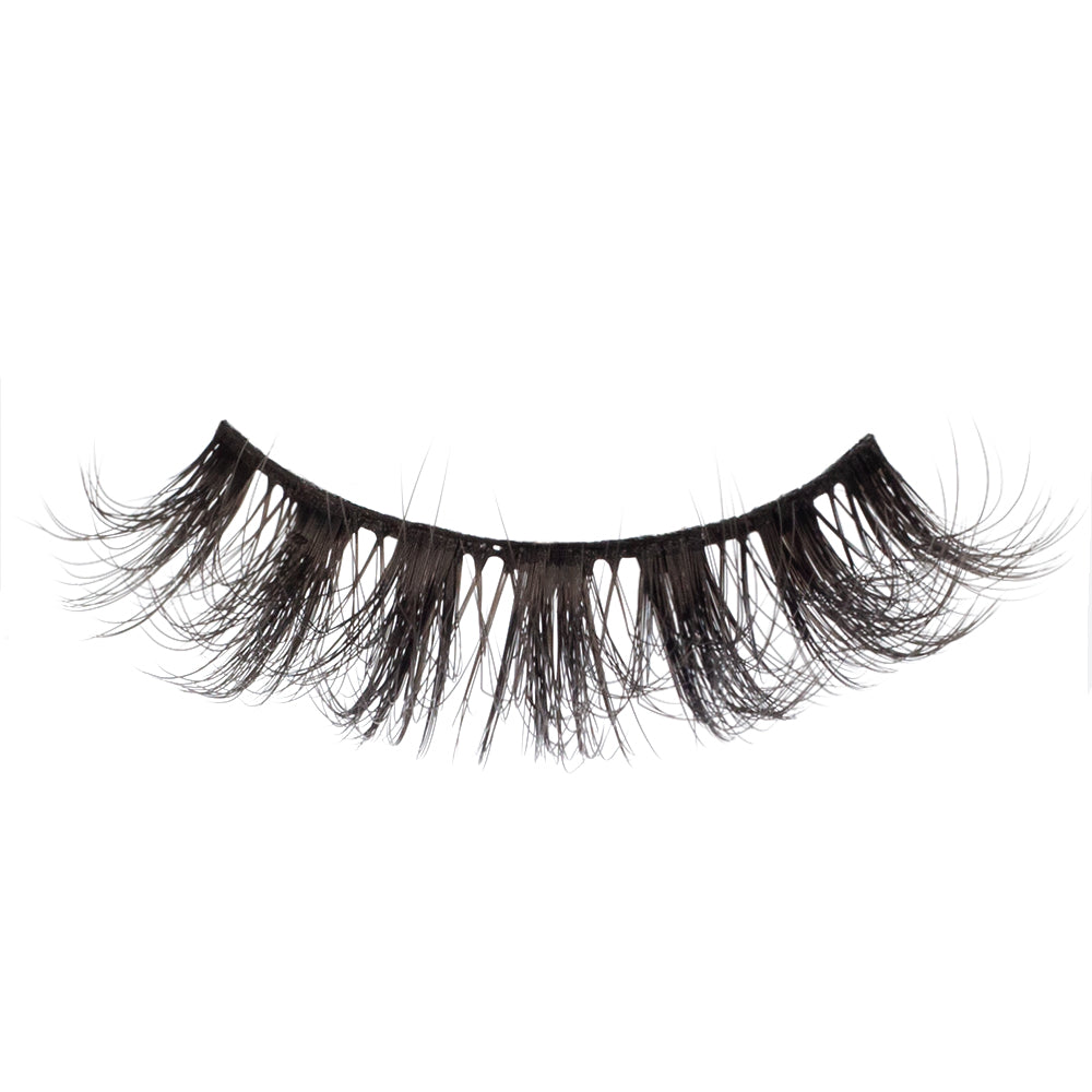 Raven lash featuring clustered, multi-length design with sweeping curls for a bold, intense eye look.